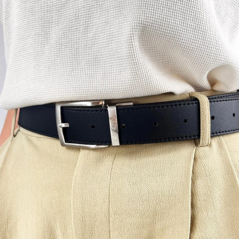 black white reversible vegan belt worn on woman